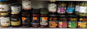 Jars of olives on the shelf